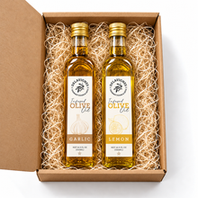 Load image into Gallery viewer, Garlic and Lemon olive oils in open gift box